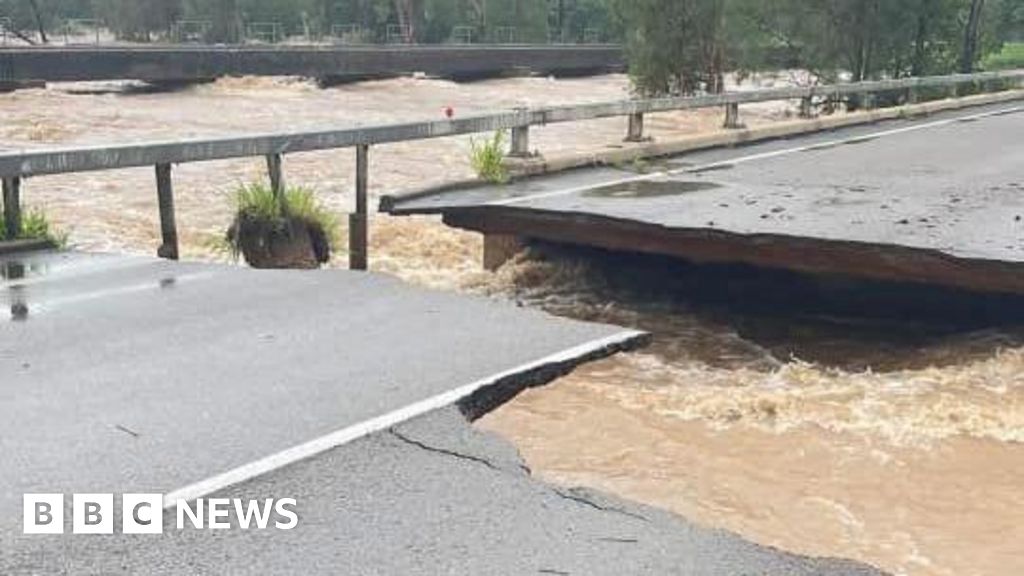 Major highway partly collapses as Australian floods worsen