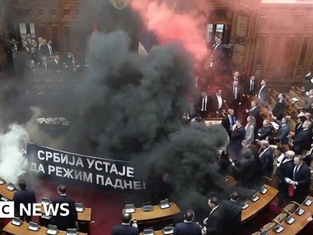 Serbia’s opposition under fire for smoke and flare protest in parliament