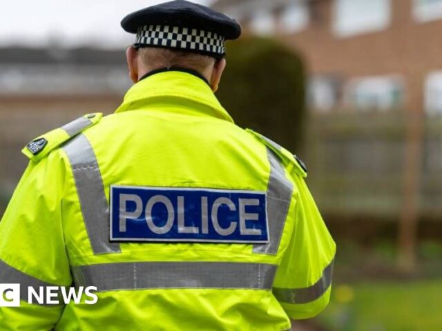 Arrest after policeman injured by car in Rusholme Manchester